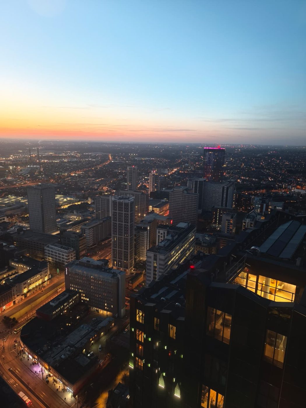 A city skyline at dusk